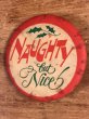 Naughtyのメッセージが書かれたヴィンテージ缶バッチ