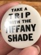 Take A Trip With The Tiffany Shadeのメッセージが書かれたヴィンテージ缶バッチ