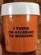 スヌーピーの“I Think I'm Allergic To Morning”のメッセージが書かれたビンテージマグカップ